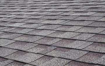 Damhead tiles for shallow pitch roofing